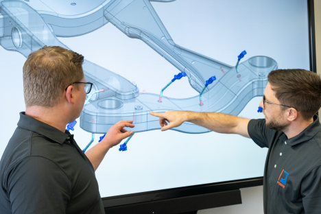 Beratung über Düsenpositionierung in einem Bauteil